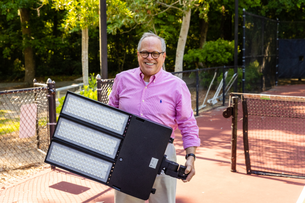 Gary Keisler with the new 500 watt LED Tennis Court light.