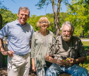 John Darby (left), CEO and president of The Beach Co., celebrates the opening with Rosebank Farms owners Louise Bennett and Sidi Limehouse. (Photo/Kiawah River)