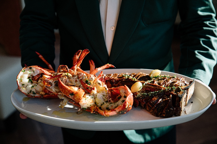 The upscale Marbled & Fin menu offers various seafood items such as caviar, lobster, oysters, varieties of fish and crab. (Photo/Andrew Cebulka)